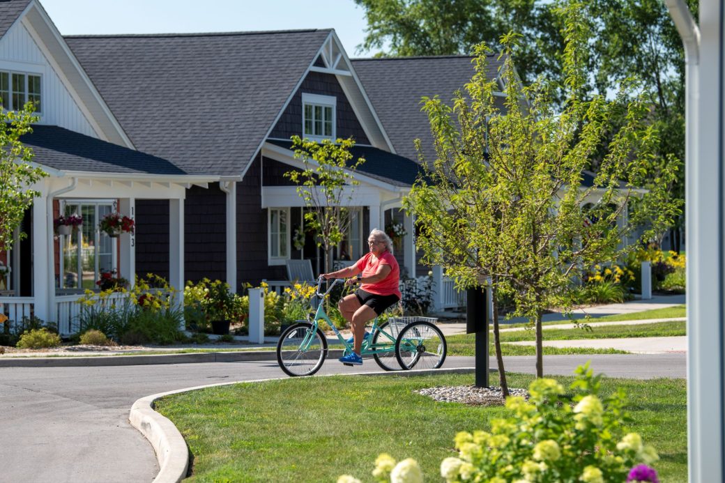 Piper Trail outdoor woman riding a blue tricycle