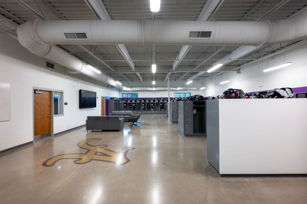 locker room with football equipment