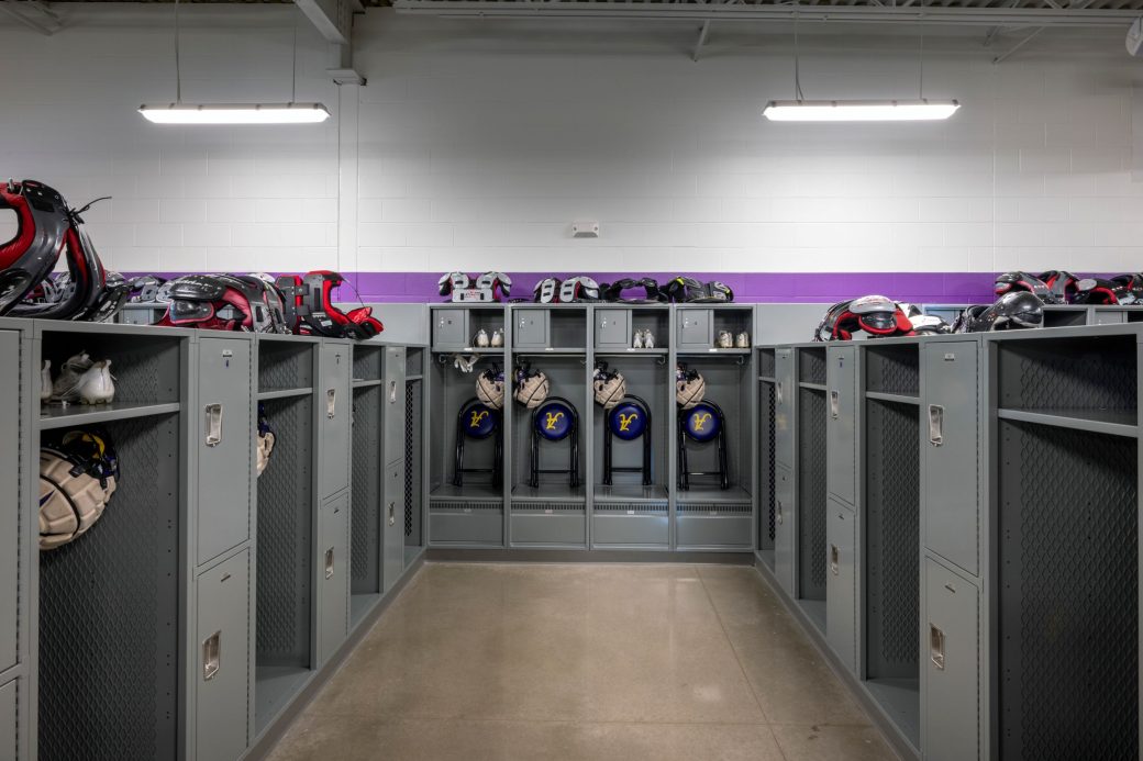 locker room with football equipment