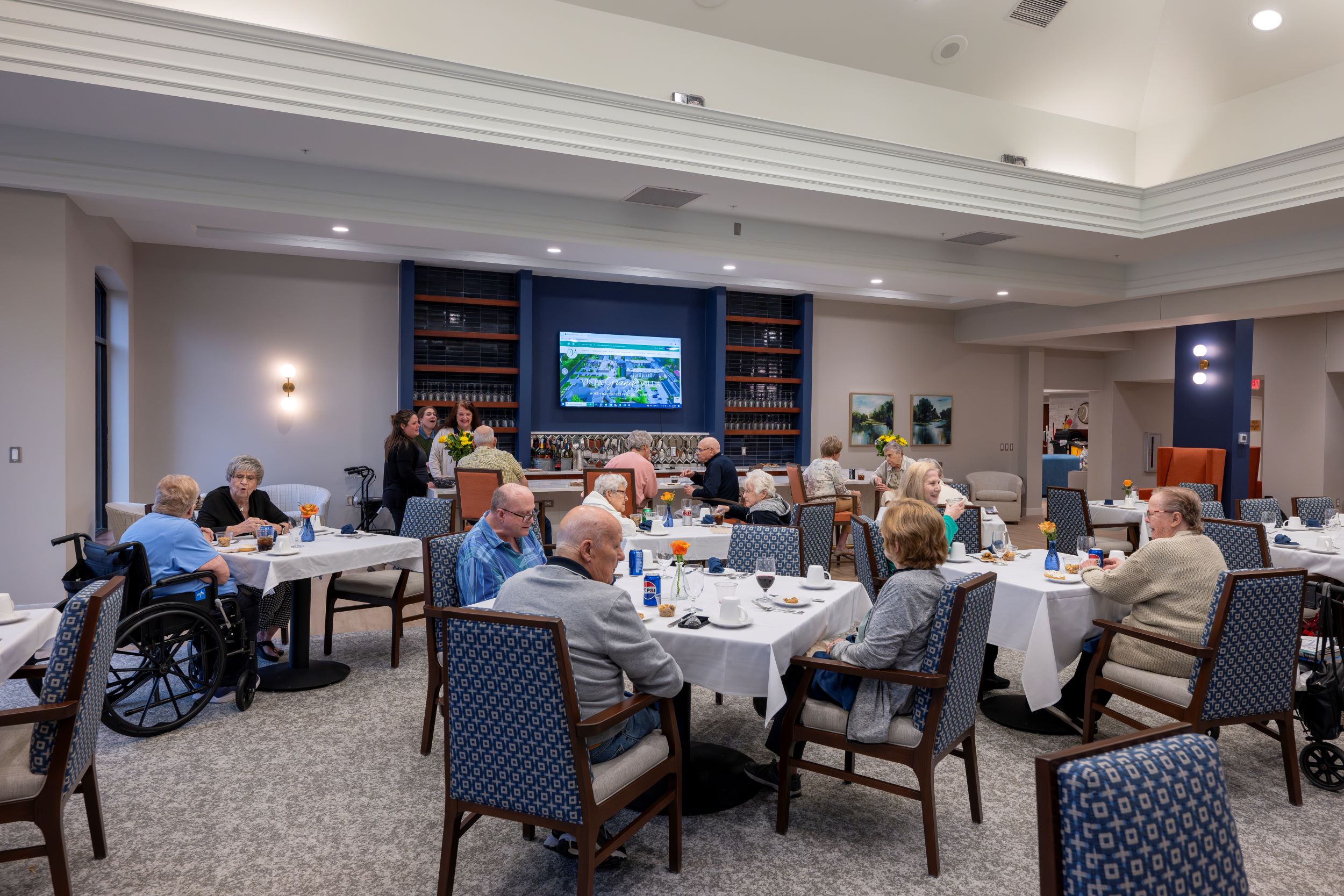 people in dining room and bar