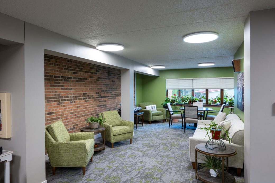 lounge area with green accents