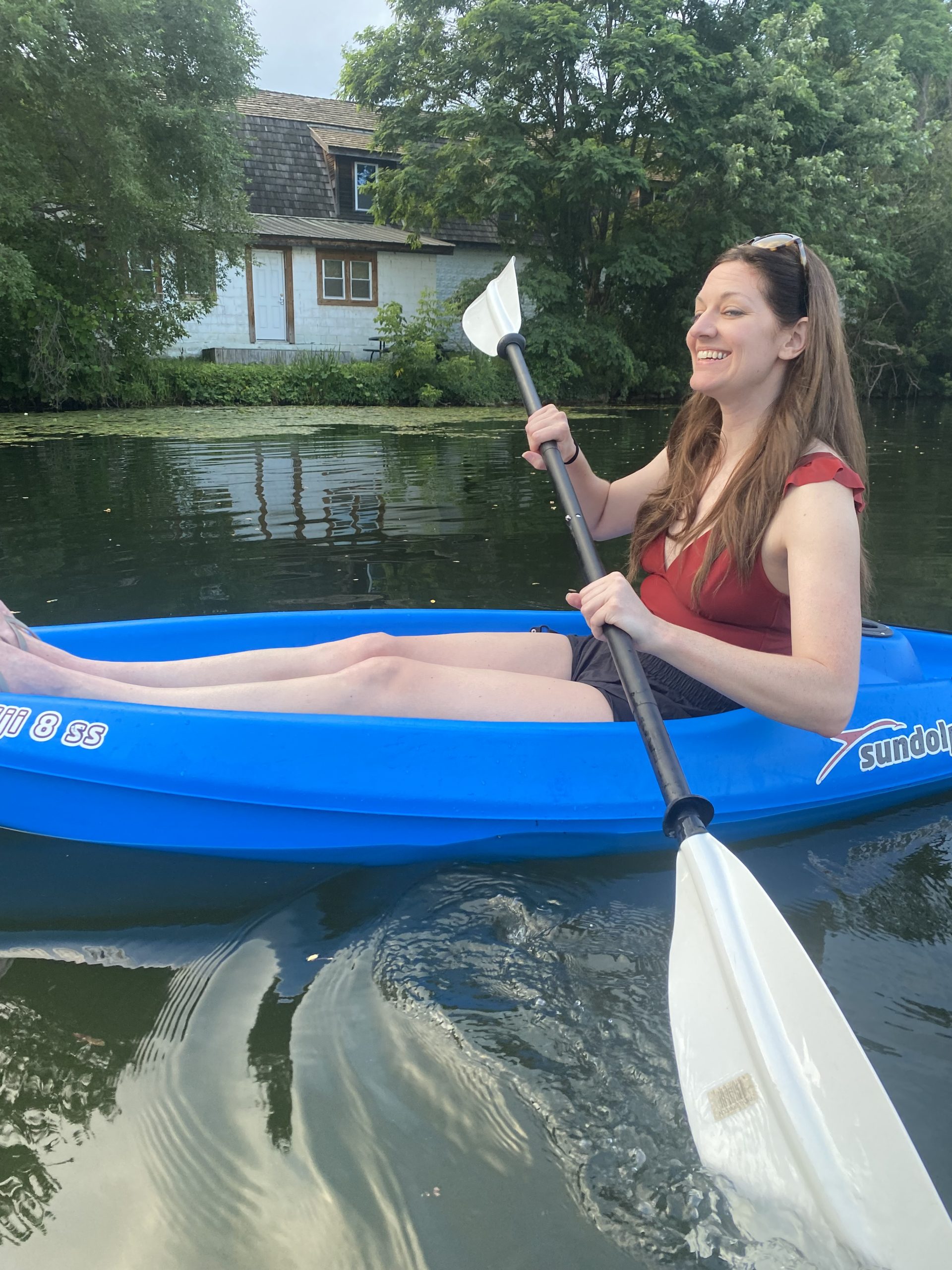 woman in blue kayak