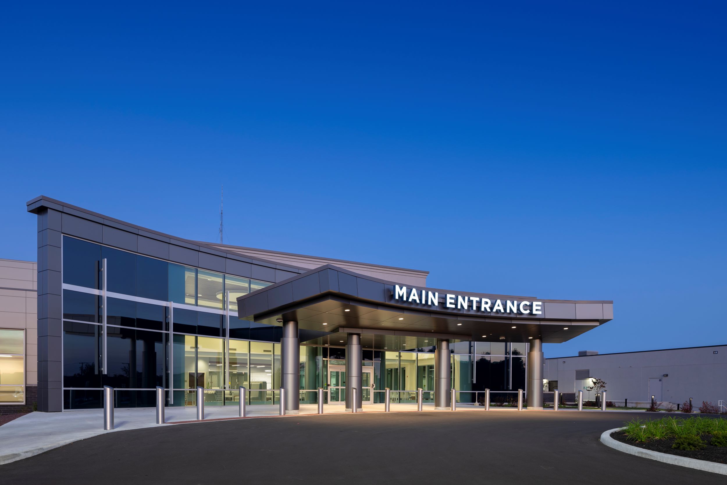 main entrance of hospital with canopy dusk