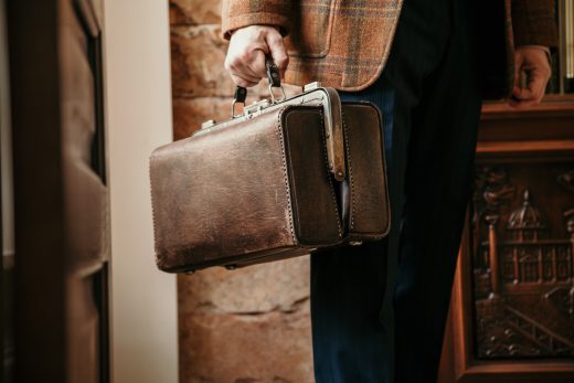 man with bag and jacket